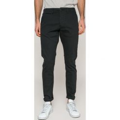Produkt by Jack & Jones - Spodnie. Spodnie męskie PRODUKT by Jack & Jones, na co dzień, l, bez wzorów, z elastanu. W wyprzedaży za 89,90 zł.