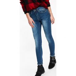 JEANSOWE SPODNIE DAMSKIE SLIM. Niebieskie spodnie damskie Top Secret, s, z jeansu. W wyprzedaży za 59,99 zł.
