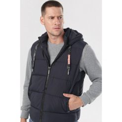 Granatowa Kamizelka Charielle. Niebieskie kurtki męskie Born2be, xl, bez wzorów, bez kaptura. Za 129,99 zł.