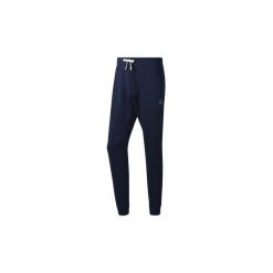 Spodnie treningowe Reebok Sport Spodnie dresowa Training Essentials Marble. Niebieskie spodnie męskie Reebok Sport, xl, bez wzorów, z dresówki, sportowe. Za 199,00 zł.