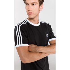 Adidas Originals 3-Stripes Koszulka Czarny. Czarne podkoszulki męskie adidas Originals, s, bez wzorów, z bawełny, bez kołnierzyka, z krótkim rękawem, krótkie. Za 128,95 zł.