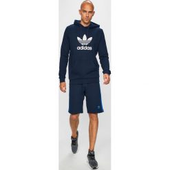 Adidas Originals - Bluza. Niebieskie bluzy męskie adidas Originals, s, z aplikacjami, z elastanu, z kapturem, bez rękawów, z kapturem. W wyprzedaży za 219,90 zł.