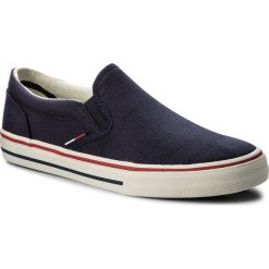 Tenisówki TOMMY JEANS - Textile Slip On EM0EM00002 Ink 006. Niebieskie półbuty męskie Tommy Jeans, na co dzień, bez wzorów, z jeansu, bez zapięcia. W wyprzedaży za 199,00 zł.