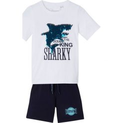 T-shirt z obracanymi cekinami + krótkie spodnie (2 części) bonprix biało-ciemnoniebieski. Białe t-shirty chłopięce bonprix, bez wzorów, z dżerseju, z krótkim rękawem. Za 49,99 zł.