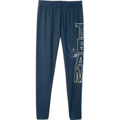 Legginsy sportowe bonprix ciemnoniebieski. Niebieskie legginsy dziewczęce marki bonprix, w paski, z materiału, sportowe. Za 24,99 zł.