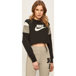 Nike Sportswear - Bluza. Czarne bluzy damskie Nike Sportswear, s, z nadrukiem, z elastanu, bez rękawów, bez kaptura. Za 199,90 zł.
