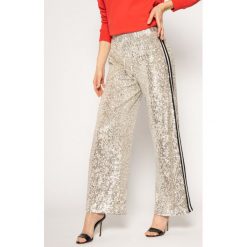 Spodnie materiałowe Guess JENNIFER LOPEZ Skyler W02B18 K9NN0. Szare spodnie damskie Guess, m, z aplikacjami, z tkaniny. W wyprzedaży za 329,00 zł.