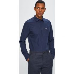 Tommy Jeans - Koszula. Niebieskie koszule męskie Tommy Jeans, s, bez wzorów, z bawełny, klasyczne, z klasycznym kołnierzykiem, z długim rękawem. Za 299,90 zł.