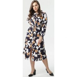 Granatowa Sukienka Afsana. Niebieskie sukienki damskie Born2be, xl, bez wzorów, z tkaniny, z wykładanym kołnierzem, bez rękawów, długie, midi, rozkloszowane. Za 79,99 zł.