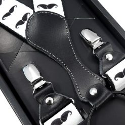 Białe szelki męskie w czarne wąsy SZ58. Czarne szelki męskie Modini Moda Męska. Za 48,60 zł.