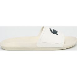 Lacoste - Klapki. Białe kapcie męskie Lacoste, z materiału. Za 169,90 zł.