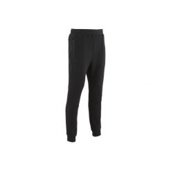 Spodnie dresowe Gym & Pilates 540 Free Move męskie. Czarne spodnie męskie DOMYOS, xl, bez wzorów, z elastanu. Za 99,99 zł.