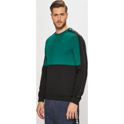Reebok - Bluza. Bluzy męskie Reebok, s, bez wzorów, z poliesteru, z okrągłym kołnierzem, bez rękawów, bez kaptura. W wyprzedaży za 169,90 zł.