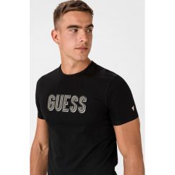 Guess Front Logo Koszulka Czarny. Czarne podkoszulki męskie Guess, xl, z nadrukiem, z elastanu, bez kołnierzyka, krótkie. Za 133,95 zł.
