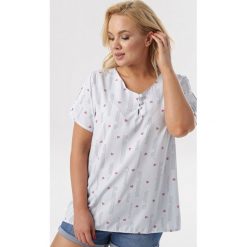 Jasnoniebieska Bluzka Artemisia. Niebieskie bluzki damskie Born2be, xl, bez wzorów, bez kołnierzyka, bez rękawów. W wyprzedaży za 49,99 zł.