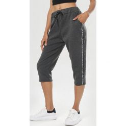 Ciemnoszare Spodnie Physamene. Szare jeansy damskie Born2be, xl. W wyprzedaży za 29,99 zł.