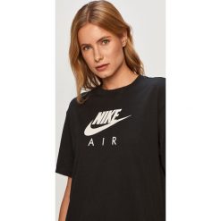 Nike Sportswear - T-shirt. Niebieskie topy damskie Nike Sportswear, s, z nadrukiem, z bawełny, z okrągłym kołnierzem. Za 129,90 zł.