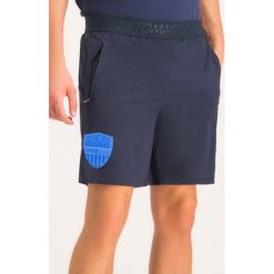Szorty sportowe Tommy Sport Reflective S20S200252. Niebieskie spodnie męskie Tommy Sport, s, bez wzorów, z elastanu, sportowe. W wyprzedaży za 199,00 zł.