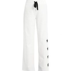 Spodnie dresowe damskie: Juicy Couture TERRY STAR LOGO PANT Spodnie treningowe bleached bone