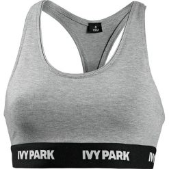 Top sportowy w kolorze szarym. Szare topy damskie Street & Sports Wear, xs, bez wzorów, z materiału, bez rękawów. W wyprzedaży za 55,95 zł.