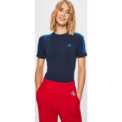 Adidas Originals - T-shirt. Niebieskie topy damskie adidas Originals, bez wzorów, z elastanu, z okrągłym kołnierzem. W wyprzedaży za 149,90 zł.