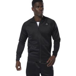 MĘSKA BLUZA REEBOK TRAINING SPACER (M). Bluzy męskie Reebok, m, bez wzorów, z dzianiny, z podwójnym kołnierzykiem, bez rękawów, bez kaptura. W wyprzedaży za 229,99 zł.
