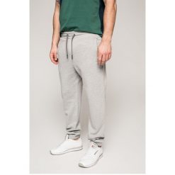 Tommy Jeans - Spodnie. Szare jeansy męskie z dziurami Tommy Jeans, z bawełny. Za 349,90 zł.
