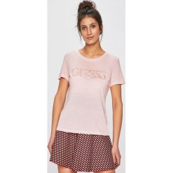 Guess Jeans - Top. Czarne bluzki damskie marki Guess Jeans, s, z nadrukiem, z bawełny, z okrągłym kołnierzem, z krótkim rękawem. Za 169,90 zł.