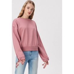 Bluza z wiązaniami na rękawach - Różowy. Różowe bluzy damskie Sinsay, s, bez wzorów, bez rękawów, bez kaptura. W wyprzedaży za 29,99 zł.