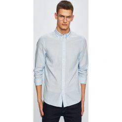 Calvin Klein - Koszula. Białe koszule męskie Calvin Klein, m, bez wzorów, z bawełny, casualowe, button down, z długim rękawem. W wyprzedaży za 249,90 zł.
