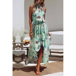 Sukienka KARYNA MINT. Zielone sukienki damskie IVET, xl, bez wzorów, z asymetrycznym kołnierzem, bez rękawów, długie, asymetryczne. W wyprzedaży za 39,00 zł.