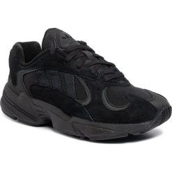 Buty adidas - Yung-1 G27026 Cblack/Cblack/Carbon. Czarne półbuty męskie Adidas, na co dzień, bez wzorów, ze skóry, bez zapięcia. W wyprzedaży za 419,00 zł.