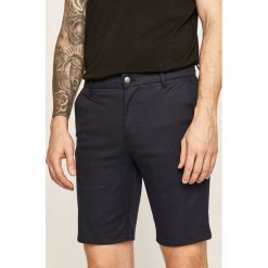 Calvin Klein Jeans - Szorty. Brązowe spodenki i szorty męskie Calvin Klein Jeans, bez wzorów, z elastanu, casualowe. Za 299,90 zł.