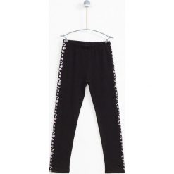 Lemon Explore - Legginsy dziecięce 122-164 cm. Czarne spodnie dziewczęce marki LEMON explore, z nadrukiem, z elastanu. W wyprzedaży za 39,90 zł.