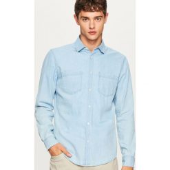 Jeansowa koszula slim fit - Niebieski. Niebieskie koszule męskie jeansowe marki Reserved, m. Za 119,99 zł.