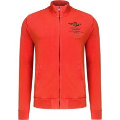Bluza AERONAUTICA MILITARE. Pomarańczowe bluzy męskie Aeronautica Militare, z haftami, ze stójką, bez rękawów, bez kaptura. W wyprzedaży za 420,00 zł.