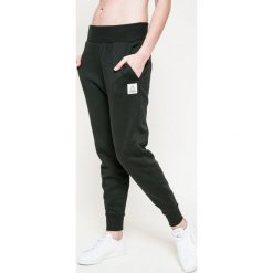 Reebok - Spodnie. Czarne spodnie damskie Reebok, s, bez wzorów, z bawełny. W wyprzedaży za 169,90 zł.