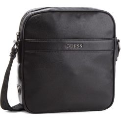 Saszetka GUESS - HM6536 POL84 BLA. Czarne torby męskie skórzane marki Guess, z aplikacjami, ze skóry ekologicznej, młodzieżowe. Za 349,00 zł.