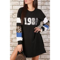 Bluza NIKETA. Czarne bluzy damskie s, długie. W wyprzedaży za 39,00 zł.