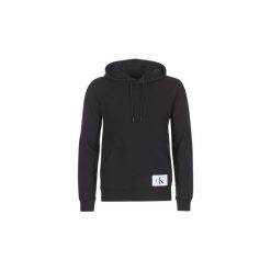 Bluzy Calvin Klein Jeans HOMEROS 2 SLIM HD. Czarne bluzy męskie marki Calvin Klein Jeans, xxl, bez wzorów, z jeansu, bez kołnierzyka, bez rękawów, bez kaptura. Za 383,20 zł.