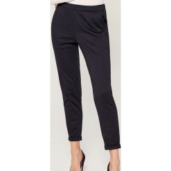 Spodnie jogger fit - Niebieski. Niebieskie spodnie damskie Mohito, bez wzorów. Za 109,99 zł.