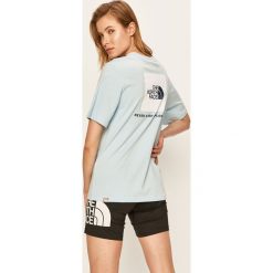 The North Face - T-shirt. Niebieskie bluzki damskie The North Face, s, z nadrukiem, z bawełny, casualowe, z okrągłym kołnierzem. W wyprzedaży za 99,90 zł.
