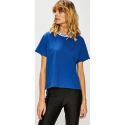 Levi's - Top. Niebieskie topy damskie marki Levi's®, s, z bawełny, z okrągłym kołnierzem. Za 129,90 zł.