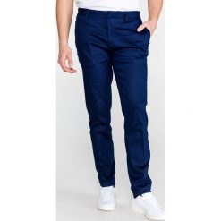 Scotch & Soda Spodnie Niebieski. Niebieskie spodnie męskie Scotch & Soda, bez wzorów, z elastanu. Za 533,95 zł.
