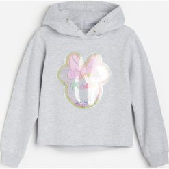 Bluza z brokatową aplikacją Myszka Minnie -. Bluzy damskie Reserved, z aplikacjami, bez rękawów, bez kaptura. Za 69,99 zł.