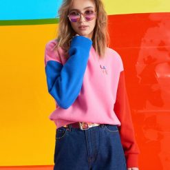 Bluza z kolorowymi rękawami - Różowy. Różowe bluzy damskie Cropp, s, bez wzorów, bez rękawów, bez kaptura. W wyprzedaży za 39,99 zł.