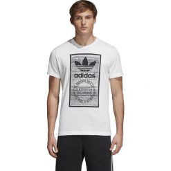 KOSZULKA ADIDAS Z LOGO TRACTION IN ACTION (L). Koszulki męskie Adidas, m, bez wzorów, z bawełny, klasyczne, z klasycznym kołnierzykiem, bez rękawów. W wyprzedaży za 119,99 zł.