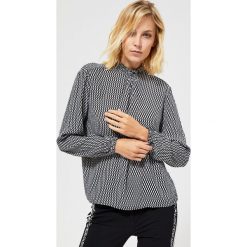 Koszula w geometryczne wzory. Czarne koszule damskie Moodo, xxl, w geometryczne wzory, z wiskozy. Za 79,99 zł.