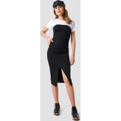 NA-KD Party Sukienka Cup Tube - Black. Czarne sukienki damskie marki NA-KD Party, na imprezę, bez wzorów, bez kołnierzyka, bez rękawów, midi, z odkrytymi ramionami. Za 80,95 zł.