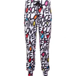 Love Moschino Spodnie treningowe multicoloured. Szare spodnie sportowe damskie marki Love Moschino, z bawełny. W wyprzedaży za 549,45 zł.